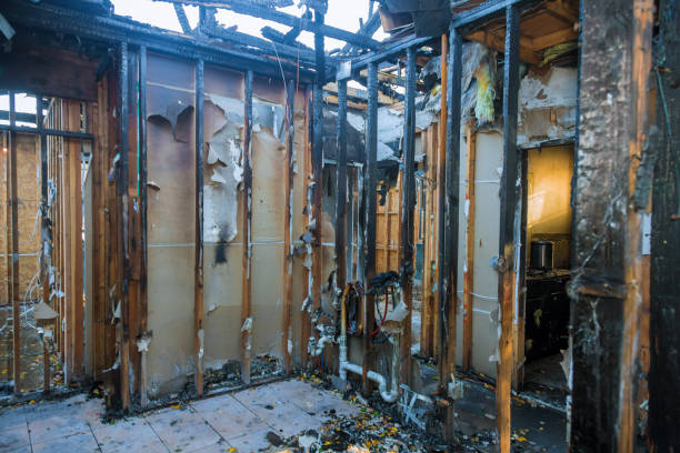 Professional Emergency Fire Cleanup technician working in Larned, KS